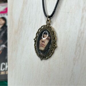 CC “Christian Coma” custom decoupage necklace.